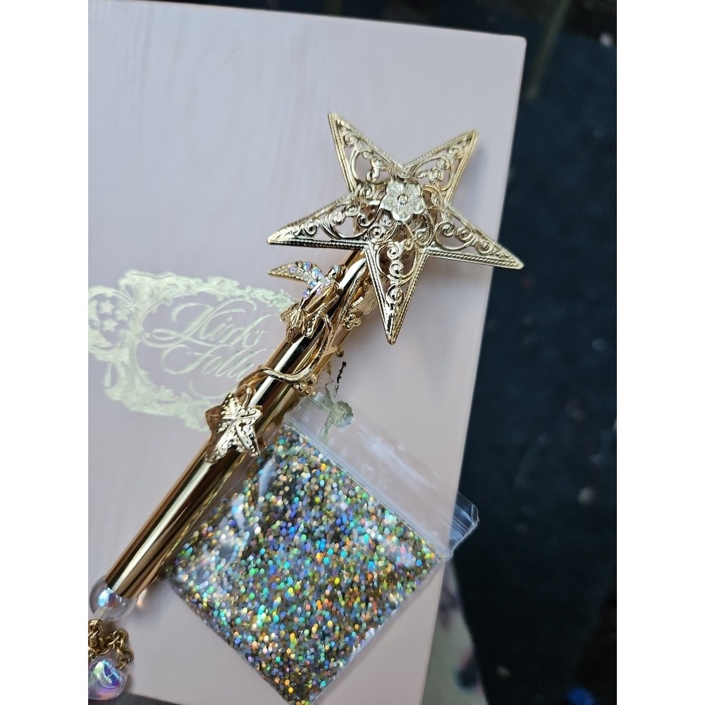 Elegant Gold Star Brooch